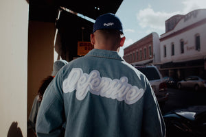 Our vintage denim jacket with our signature Defensive logo embroidery