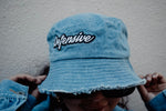 Our take on the vintage bucket hat. Our Denim bucket hat has distressed edges and our signature embroidered logo for a vintage streetwear vibe. Unisex, one size fits all. 